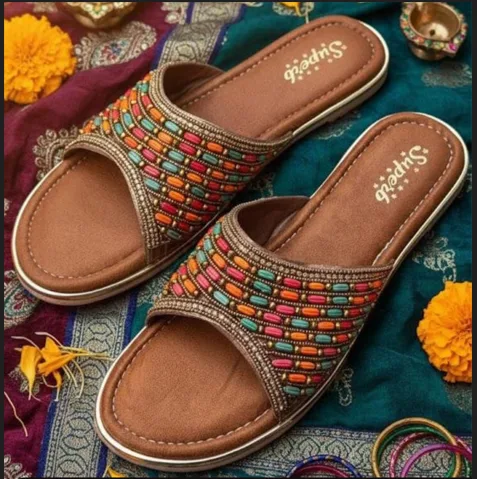 Pair of embroidered ethnic flat sandals
