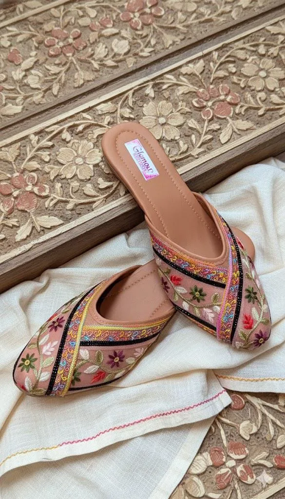 These are women's floral embroidered jutti mules