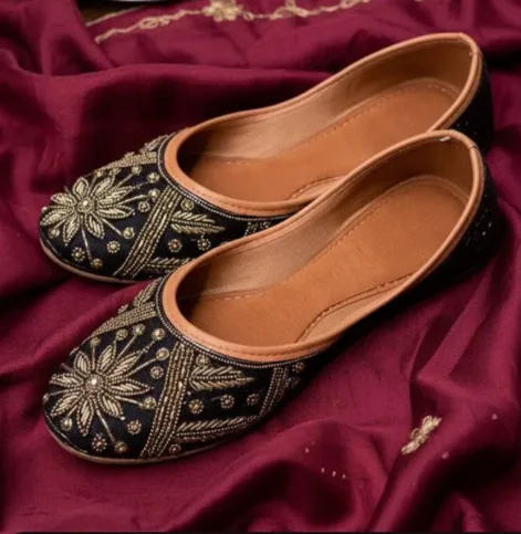 Black and gold embroidered jutti shoes for women